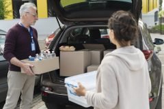 group-people-volunteering-foodbank-poor-people